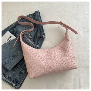 Pink woven PU leather hobo bag for women in a minimalist half-moon shoulder bag design