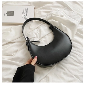 Minimalist black PU leather half-moon hobo bag with adjustable wide shoulder strap