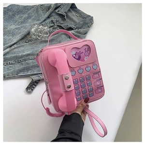 Pink retro telephone-style PU crossbody bag with dial design and heart window