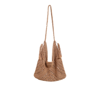 Minimalist camel woven shoulder bag with boho fringe details and a sleek knit strap