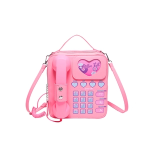 Sac bandoulière rose en forme de téléphone rétro avec poignée combiné et cœur