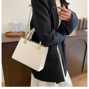 Elegant white woven texture patent leather handbag with gold handle for business women