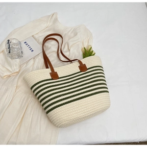 Fashion woven stripe tote bag with green stripes, brown leather handles and casual style