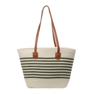 Minimalist woven tote bag in cream with dark green stripes and brown leather handles