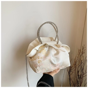 Ruched cream PU crossbody bag with rhinestone ring handle and elegant floral patterns