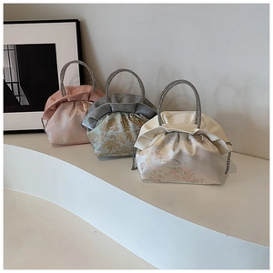 Three elegant PU pleated evening bags in pink, blue and white with rhinestone ring handles