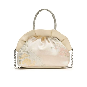 Elegant champagne satin evening bag with floral embroidery and rhinestone top handle