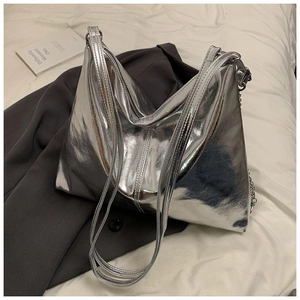 Chic silver metallic PU leather tote bag with minimalist triangular silhouette and chain