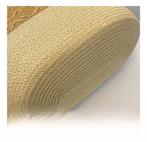 Detailed macro shot showing the tight spiral woven texture of the beige straw handbag