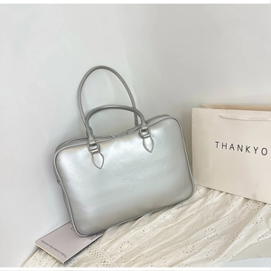 Minimalist silver metallic PU leather handbag with top handles and sleek modern design