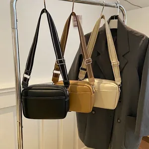 Minimalist vintage camera bag in three colors with wide striped canvas shoulder strap
