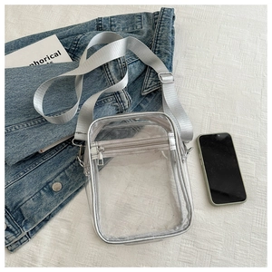 Minimalist clear PVC crossbody bag with silver nylon strap for daily sport activities