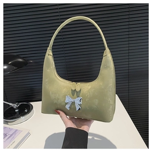 Minimalist sage green PU leather shoulder bag with metallic bow detail and marble texture