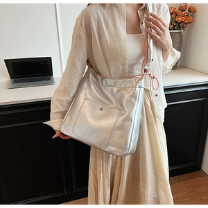 Chic silver metallic PU leather crossbody bag with metal buckle and contrast shoulder strap