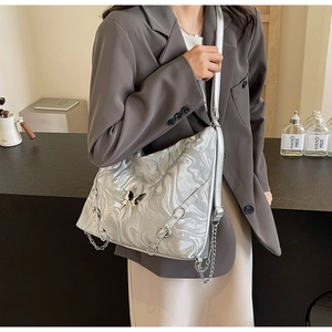 Silver PU leather shoulder bag with marble pattern and metallic butterfly clasp