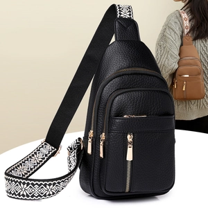 Detail of water-repellent fabric crossbody bag with wide jacquard shoulder strap