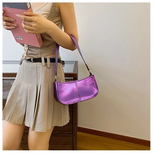 Detail of purple metallic PU leather shoulder bag with silver rivet studs for women