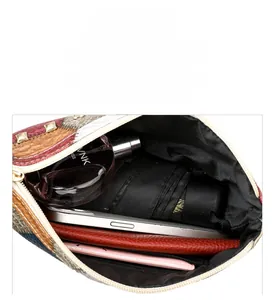 Interior view showing the large capacity of the rivet crossbody bag with personal items