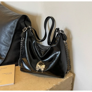 Glossy black PU leather shoulder bag with silver butterfly buckle and chain strap