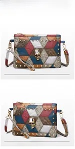 Detail of multi-texture leather patchwork bag with golden skull and square rivets