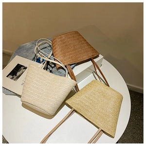Chic woven straw tote bags in coffee, cream and yellow with leather handles for women