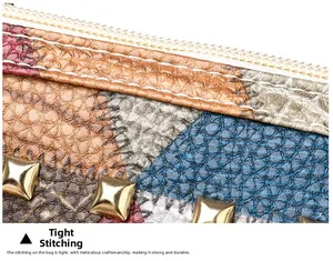 Detailed macro view of multi-color embossed leather with neat stitching and gold rivets