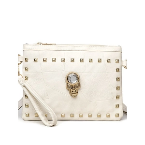 White faux leather crossbody bag with golden skull and rivet decorations in punk style