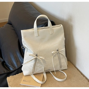 White pleated PU leather versatile backpack with bow ribbons and metallic zippers