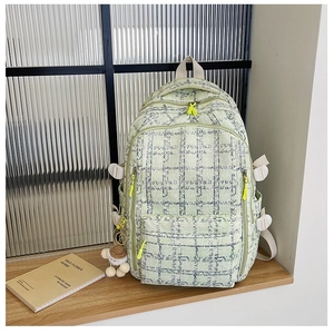 Sac à dos en velours côtelé à carreaux vert clair avec plusieurs poches et pendentif ours