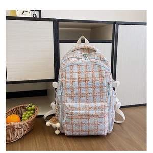 Sac à dos en velours côtelé à carreaux bleus et oranges avec breloque tissée mignonne