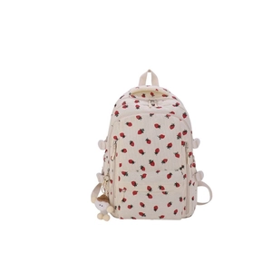 Sac à dos en velours côtelé beige à motif fraise avec un accessoire de poupée en peluche