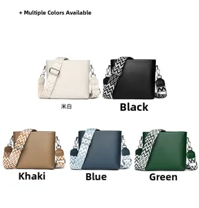 Detail showing five colors of leather crossbody bags with patterned wide fabric straps