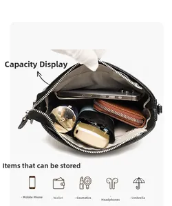 Interior view of black leather bucket bag showing grey herringbone lining and large capacity