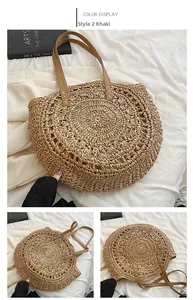 Detail of khaki round straw tote bag with woven hollow texture and brown leather straps