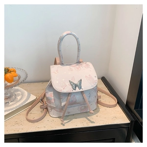 Pink butterfly print mini PU leather backpack with silver ornament and drawstring closure