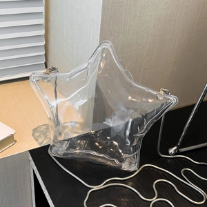 Borsa a tracolla trasparente a forma di stella con catena a serpente argento e zip