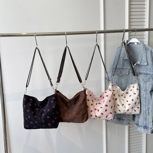 Corduroy strawberry tote bucket bags in black, brown, pink and beige with crossbody strap