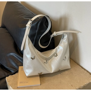 Chic pearl white PU hobo bag with silver butterfly charms and adjustable shoulder strap