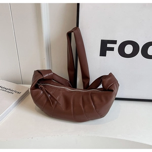 Minimalist brown PU leather crescent shoulder bag with pleated texture and wide strap