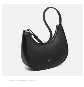 Detail shot of the silver STLY logo on black lychee grain leather crescent hobo bag