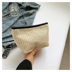 Chic cream woven straw handbag with black zipper closure for casual daily spring style