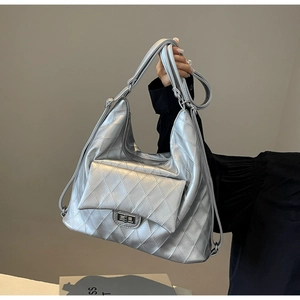 Silver quilted PU leather tote bag with metallic finish and turn-lock front pocket
