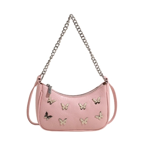 Pink crescent underarm bag with silver butterfly charms and metal chain strap