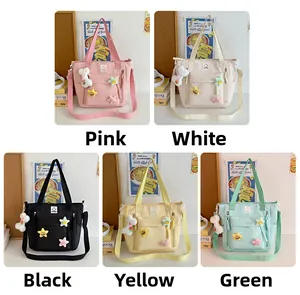 Multi-color nylon tote bags with adjustable straps and cute charms in five vibrant colors