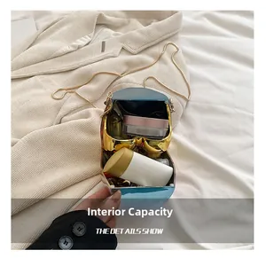 Detail view showing internal capacity of the mini crossbody bag with makeup items