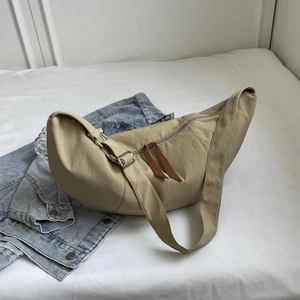 Minimalist khaki crescent crossbody bag in high-density nylon with wide shoulder strap