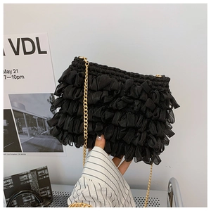 Minimalist black pleated cloud bag with golden chain strap for summer fashion