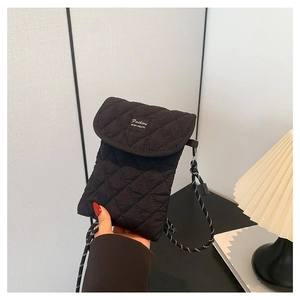 Fashionable black quilted fabric crossbody bag with trendy weave rope shoulder strap