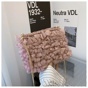 Pink ruffled tulle crossbody bag with golden chain strap for summer style