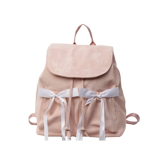 Pink ballet-style backpack featuring white satin bows and Nika embroidery on high-quality fabric